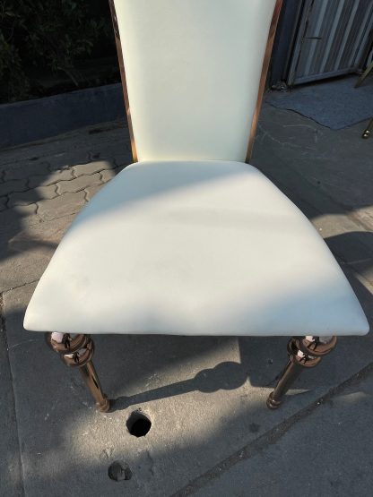 เก้าอี้ เบาะหนังเทียม สีขาว โครงสแตนเลส สีโรสโกล์ ขากลึง
